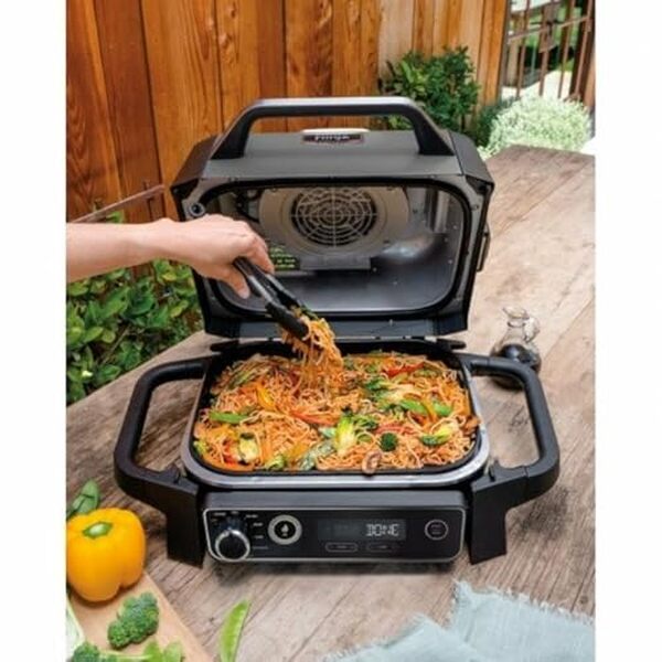 Découvrez le Ninja Woodfire OG701EU : un barbecue électrique 7 en 1 révolutionnaire. Analyse des performances, fonctionnalités et conseils d'utilisation pour des grillades optimales.
